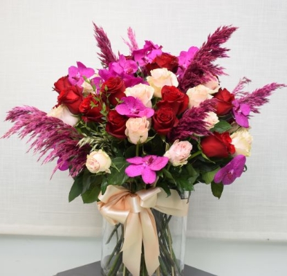 Vase Arrangement Of Mixed Roses