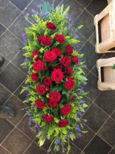 Red Rose and Limonium Casket Spray